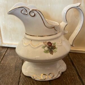 Ivory colored vintage vase or pitcher.